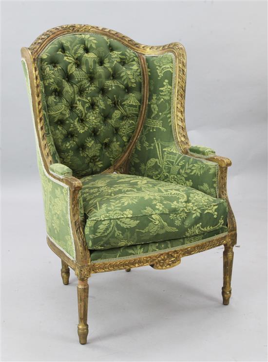 A Louis XVI style giltwood armchair, W.2ft 4in. H.3ft 7in.